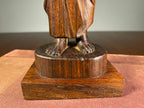 Carved Wooden Figure of a Woman Carrying a Vessel