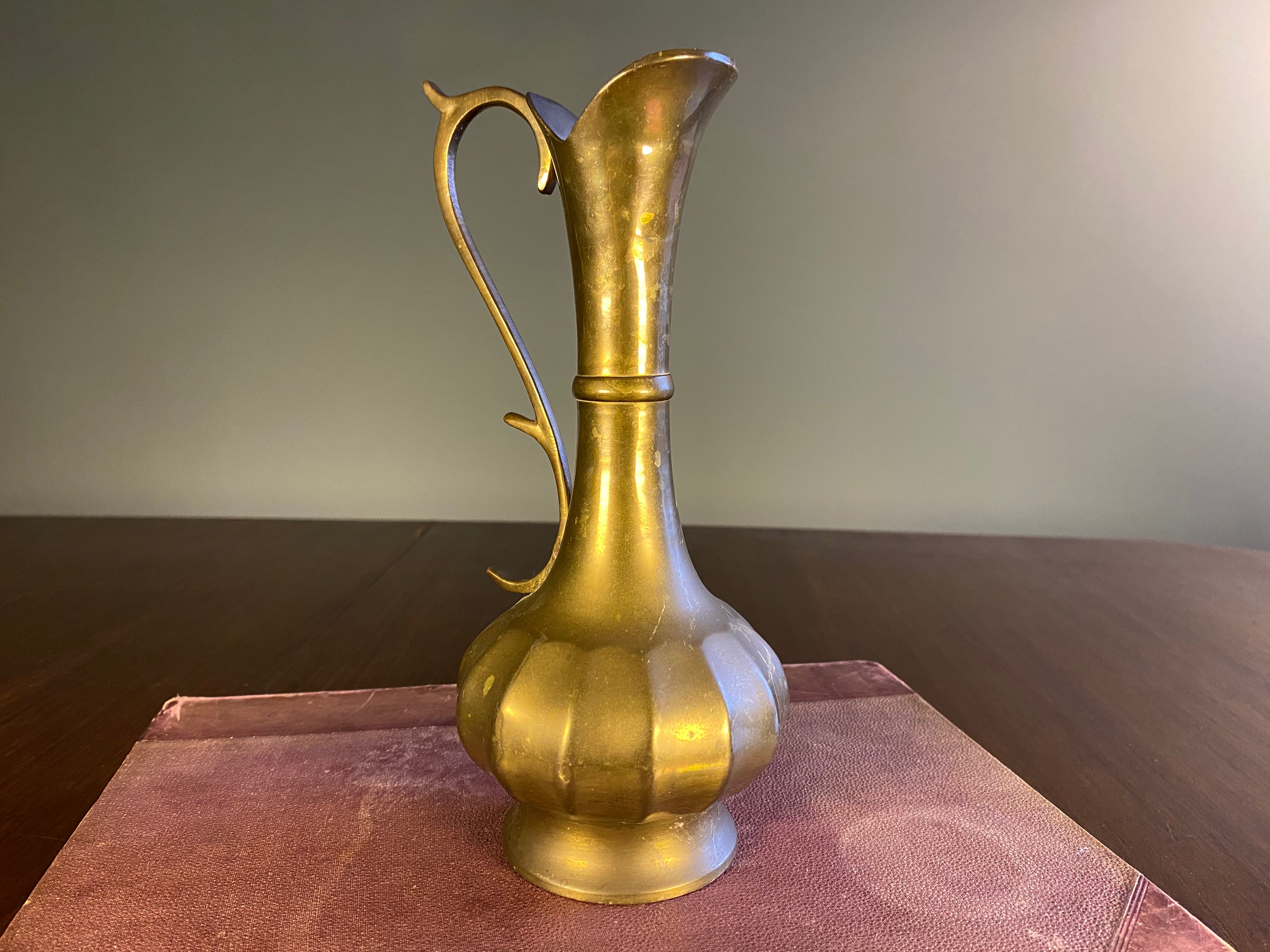 Vintage brass ewer with lobed body and angular handle