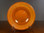 Large vintage English terracotta slipware plate with yellow concentric decoration