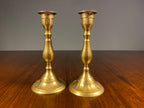 Pair of small vintage brass candlesticks with aged patina