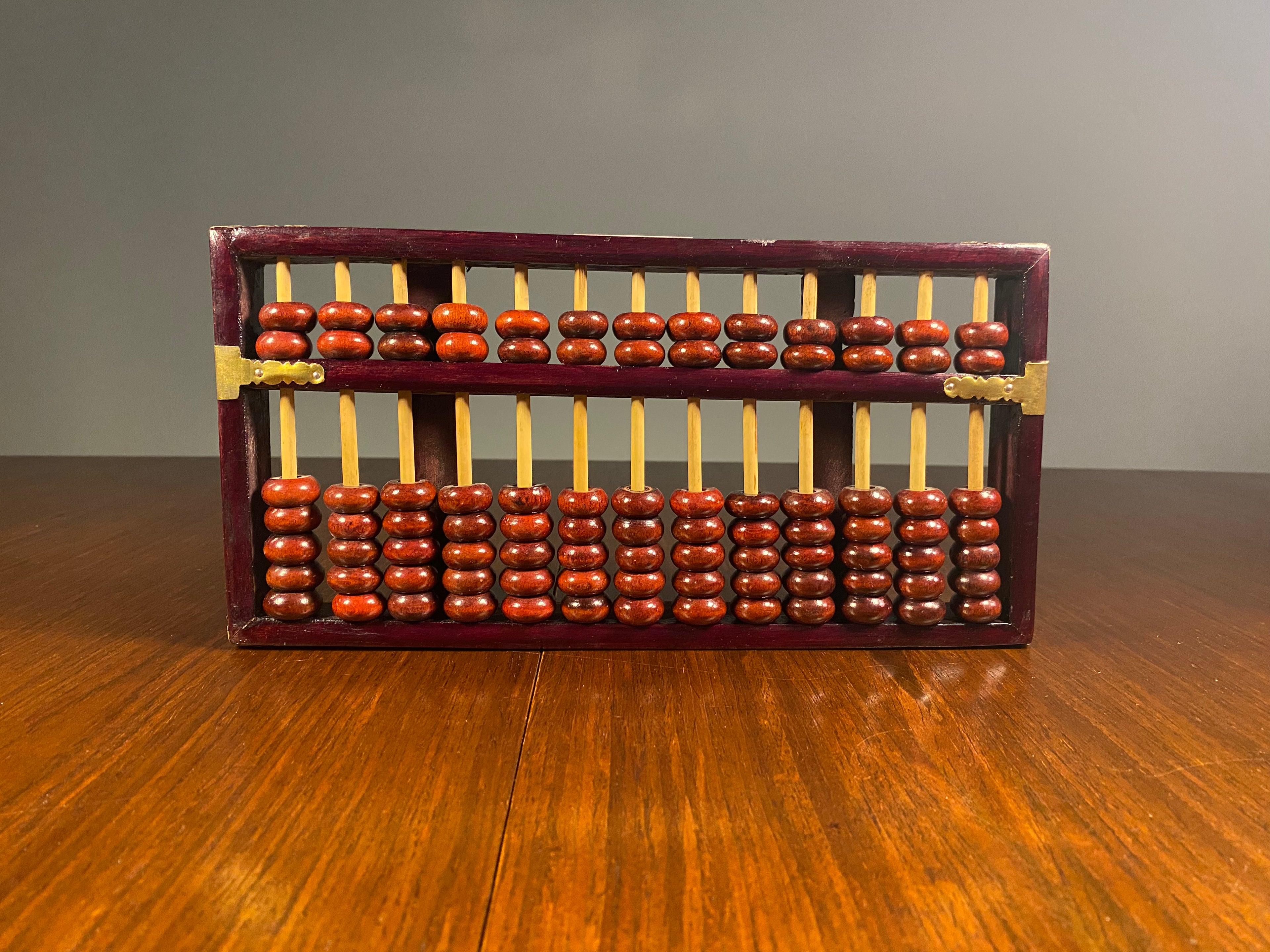 Vintage Chinese wooden suanpan abacus with red beads